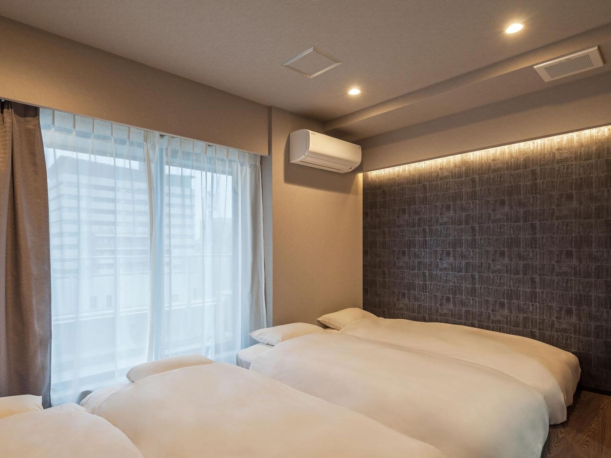 Quadruple Room with Private Bathroom
